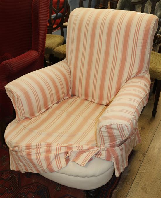 A late Victorian Howard style chair with loose cover